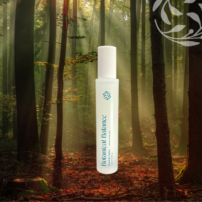 Botanical Balance skincare bottle in a forest setting